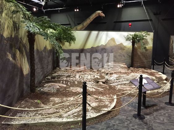 Dino Buried Statue