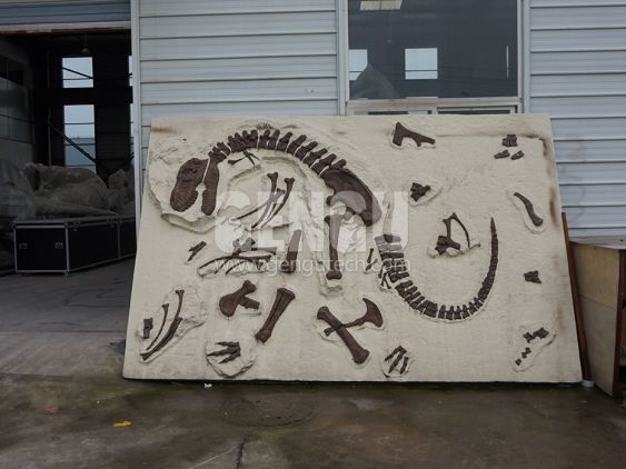 Dino Buried Statue